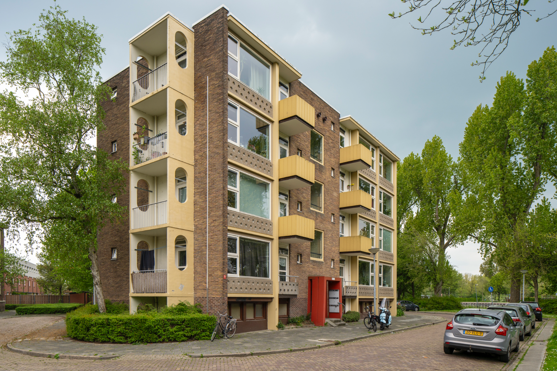 Portieketageflats met triplexwoningen