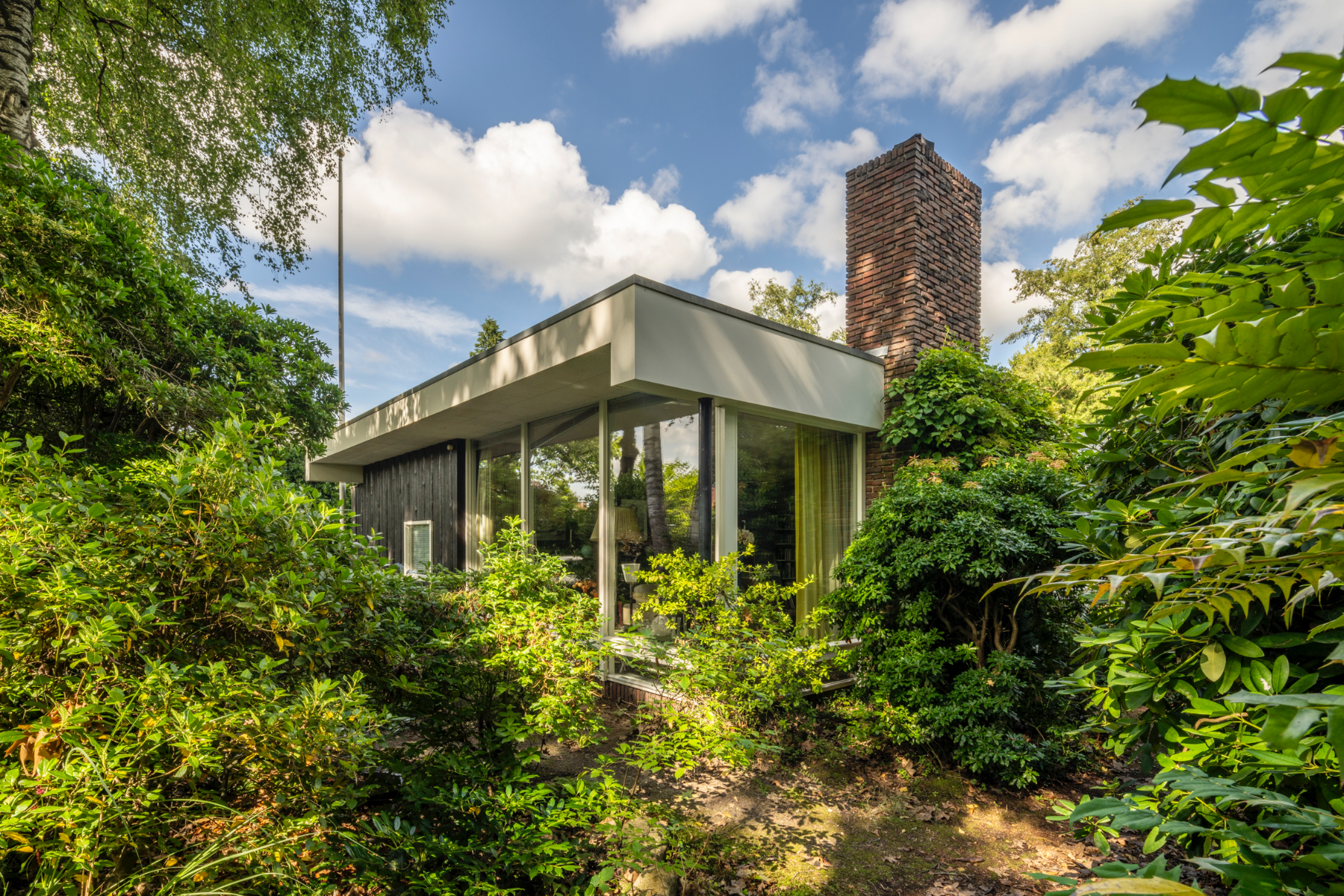 Woonhuis met atelier en garage