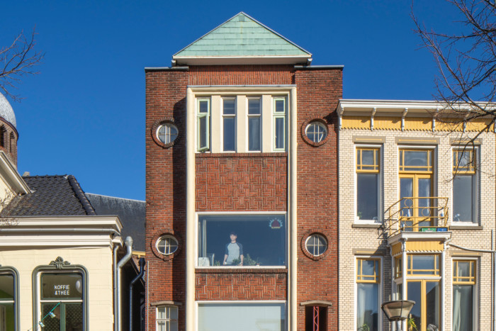 Winkelpand met bovenwoning