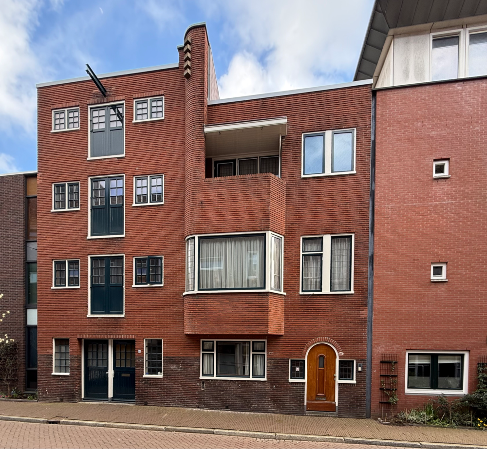 Magazijn Simmeren met pakhuis en bovenwoning